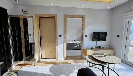 ÜSTÜNEL'DEN DUMLUPINAR'DA HAVUZLU SİTE İÇİ 2+1 ARA KAT DAİRE